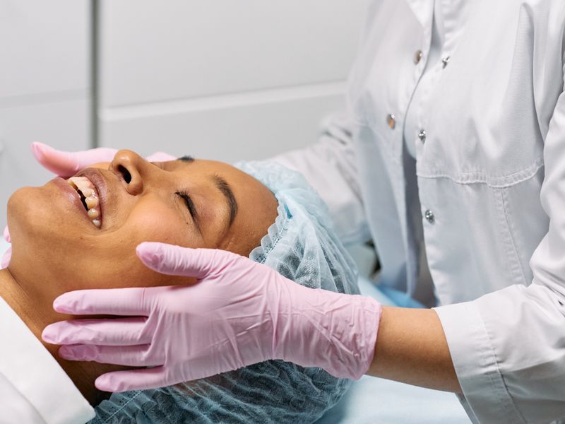 Doctor performing an aesthetic facial treatment